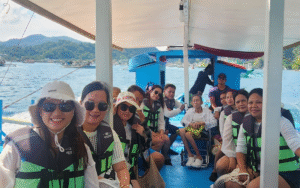 School tour group posing together during an educational trip in the Philippines