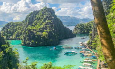 Coron Palawan limestone cliffs turquoise lagoon Philippines tour package